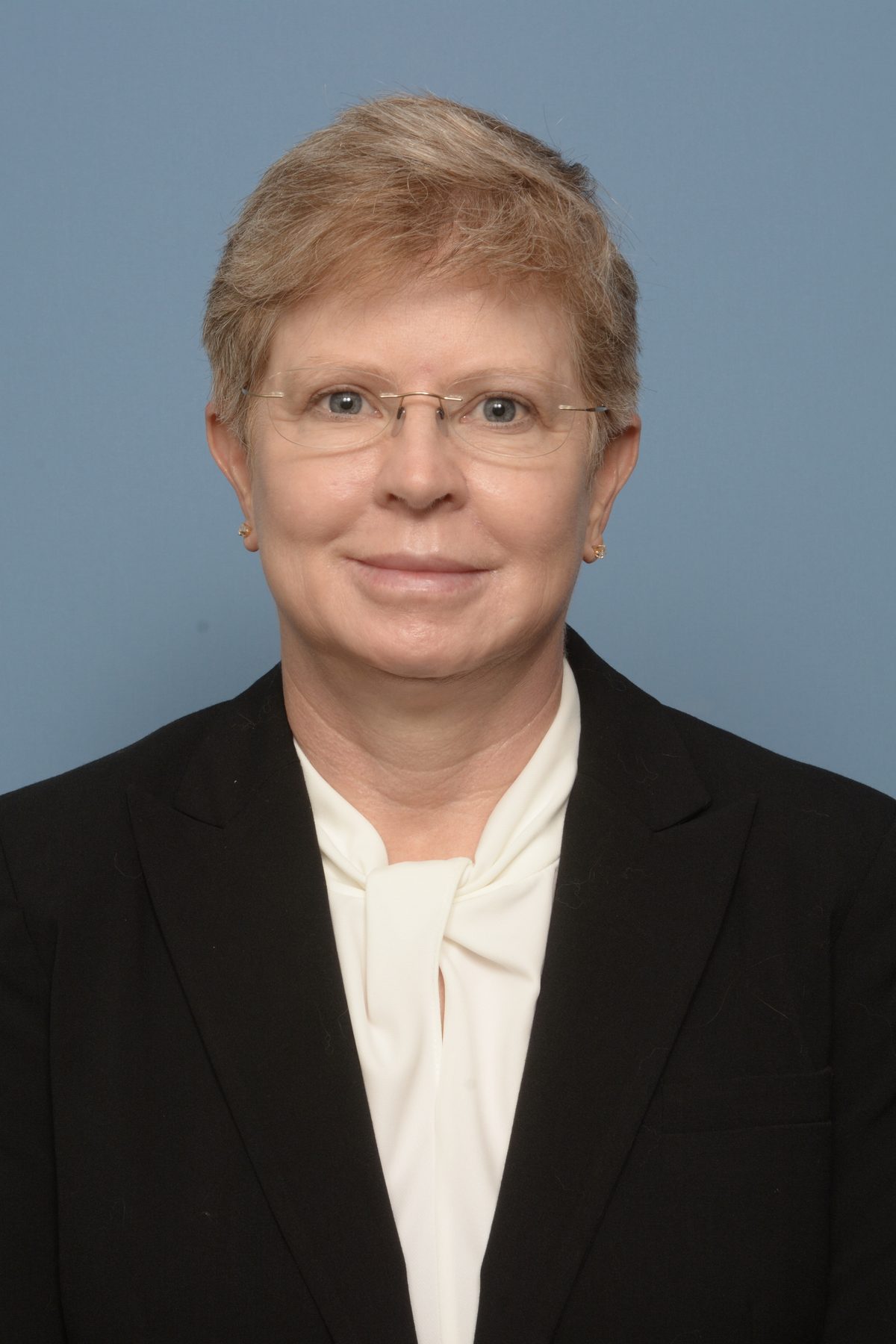 Dr. Christine Kelley, board-certified plastic surgeon